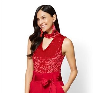 Red velvet choker bodysuit.